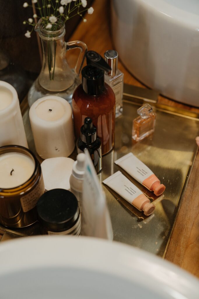 Two Glossier Cloud Paint cheek-colour tubes on a bathroom tray