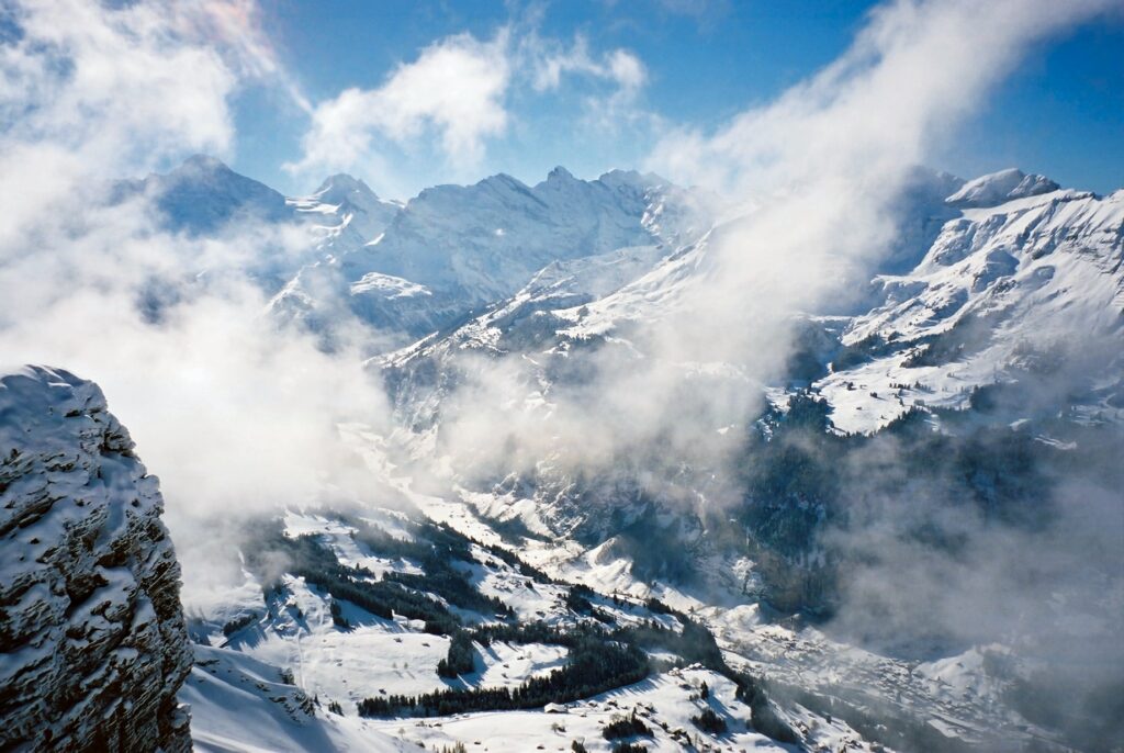 Snowy mountain slopes and clouds above the Lauterbrunnen area