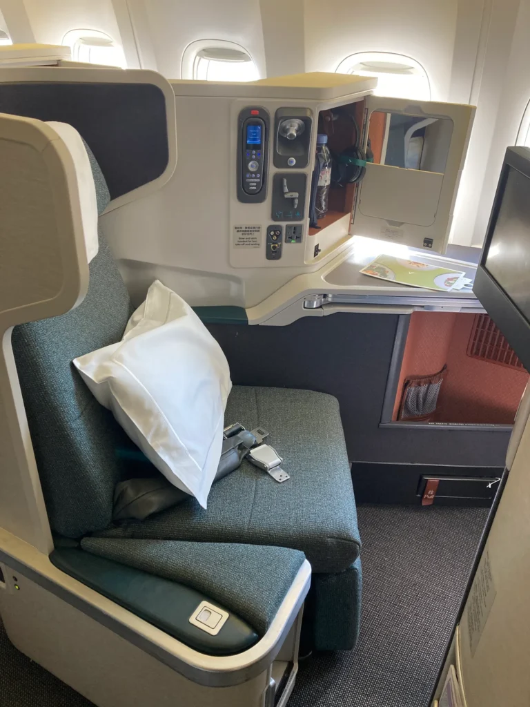 A Cathay Pacific business-class seat and screen